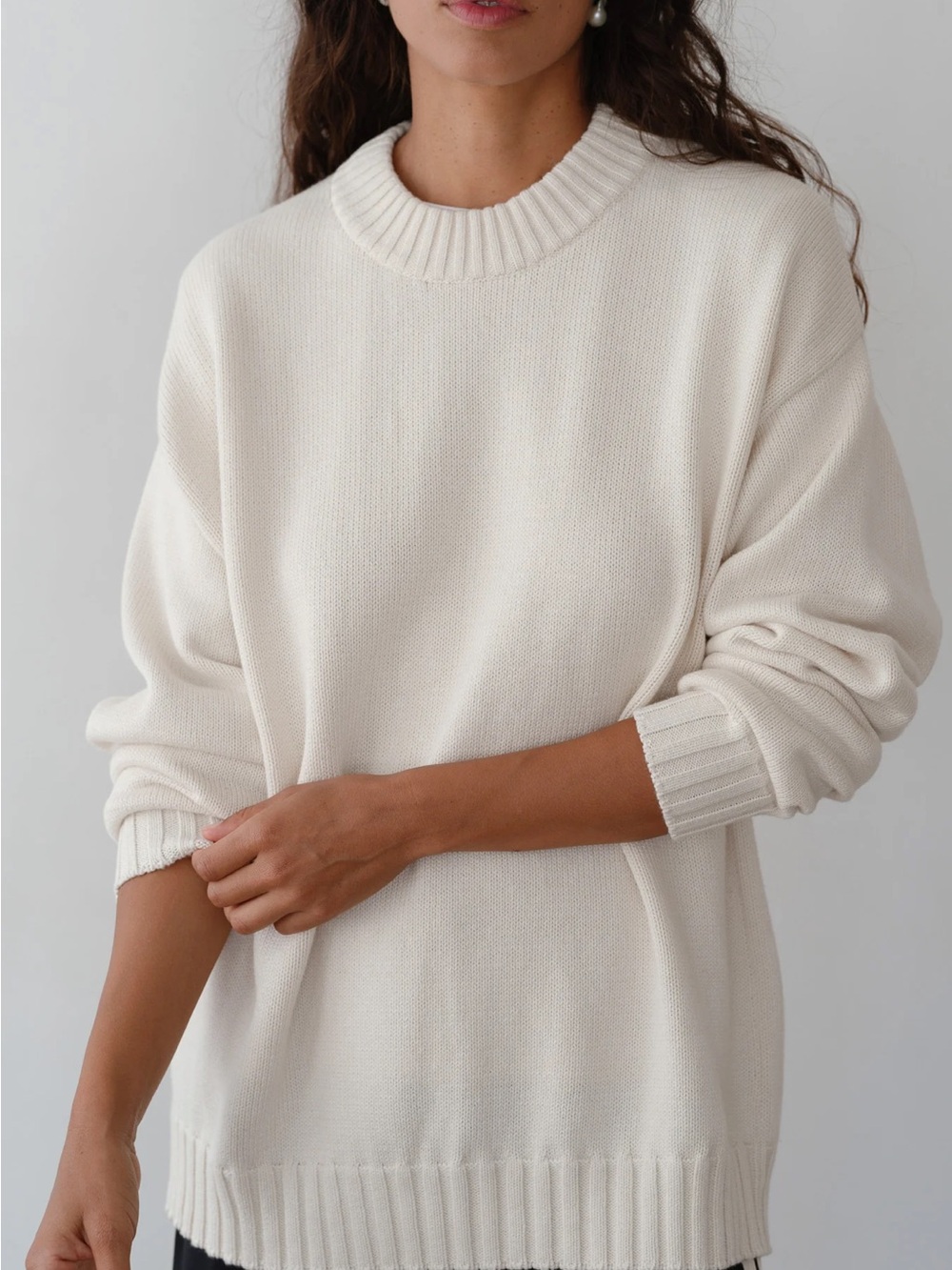 DONNI. Relaxed Crewneck Sweater in Cream - Picture 9 of 9